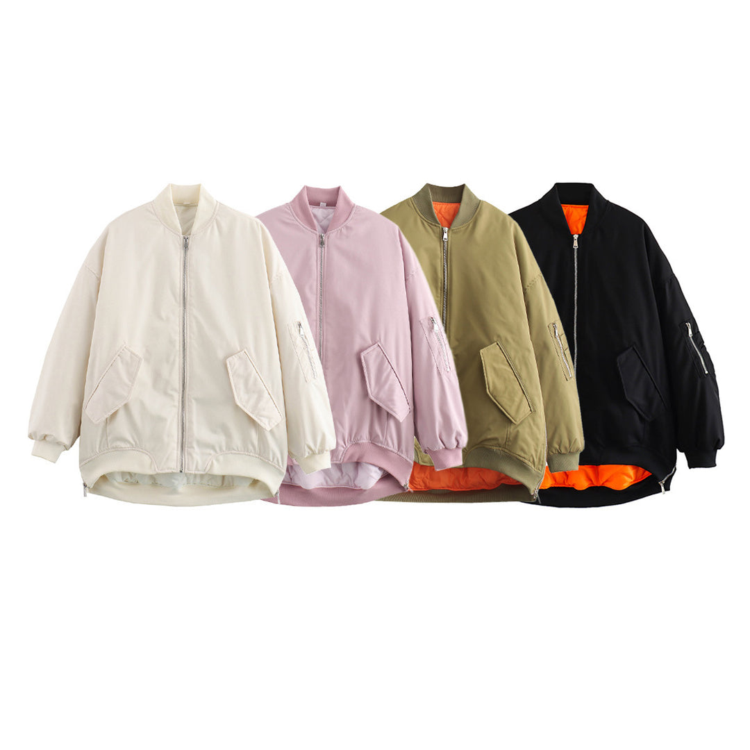 Women's oversized bomber jacket with padded contrast lining, sleeve zipper, and extended hem Mune Fashion