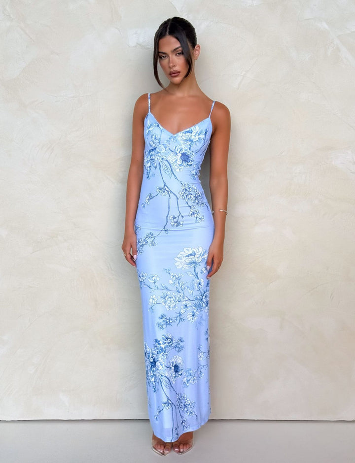 Women nan a fitted jersey slip dress with V-neck, spaghetti straps and floral leopard print Mune Fashion