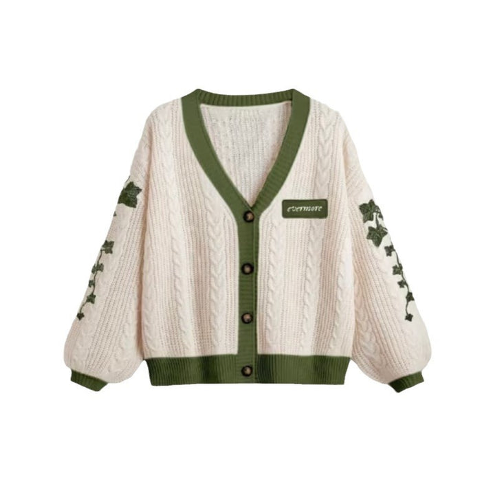 Women's knitted oversized cardigan with cable pattern, V-neck, button placket, and floral sleeve embroidery Mune Fashion