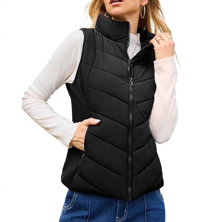 Women's quilted thermo vest with high stand-up collar and elastic side inserts Mune Fashion