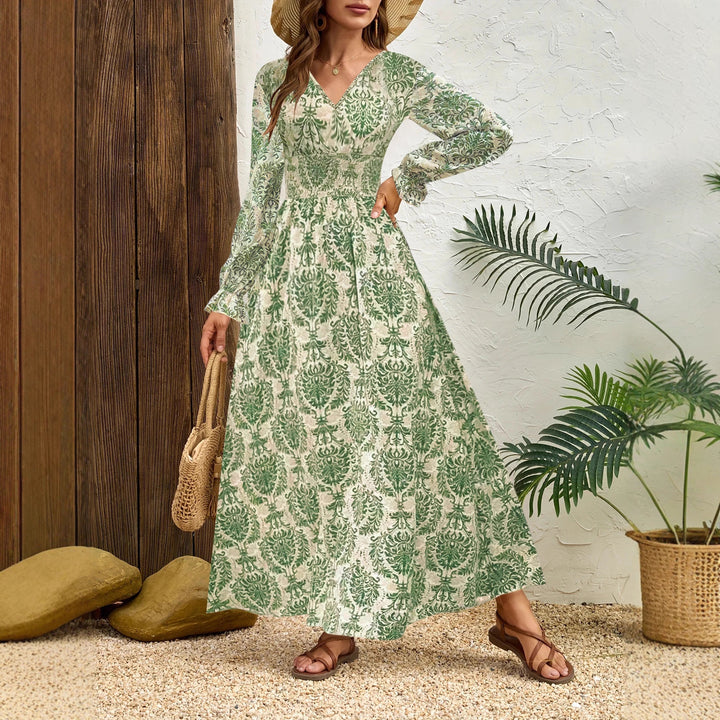 Ladies Flowing Maxi Dress with Gathered Smock Waist, Trumpet Sleeves, and Ornamental Print Mune Fashion