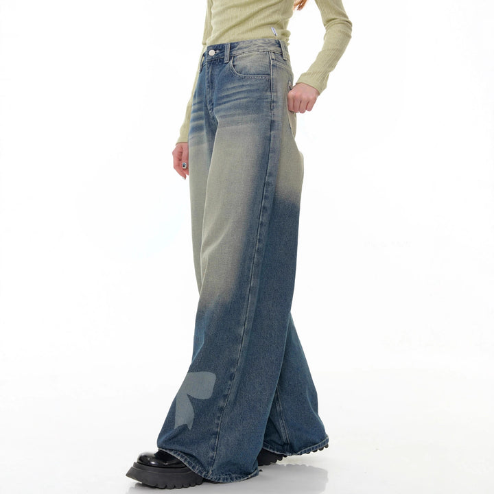 Women's high-waisted Palazzo pants made of denim with extra wide leg and bow print Mune Fashion