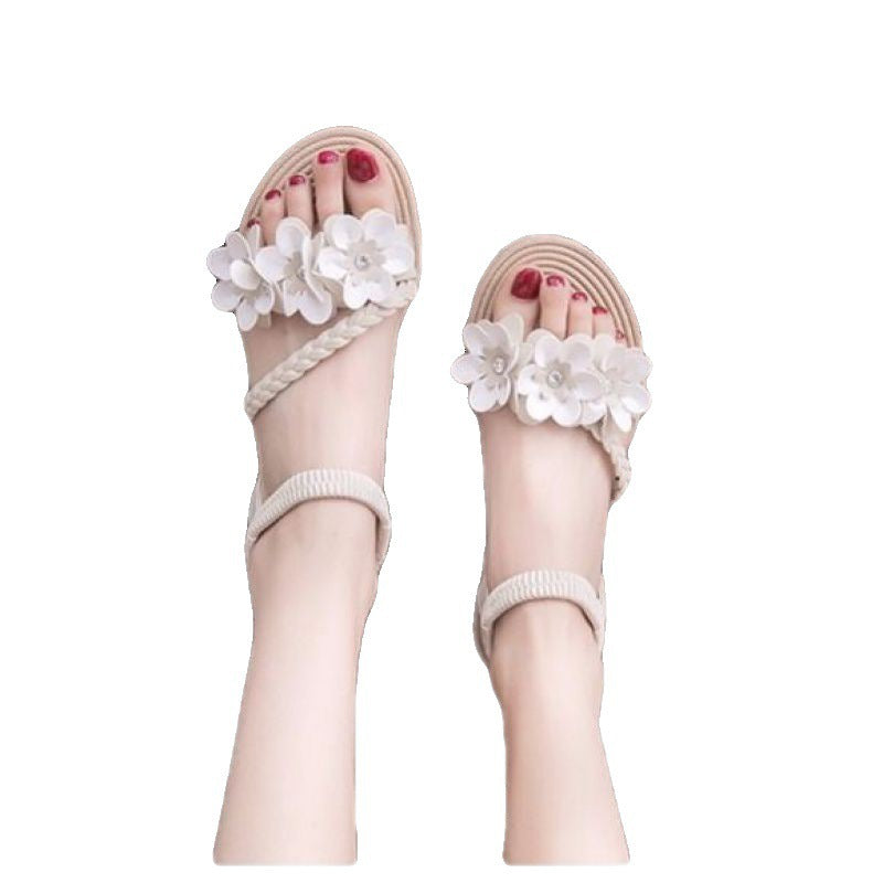 Women's playful strap sandal with braided decorative bands, flower appliqués, and elastic heel strap Mune Fashion