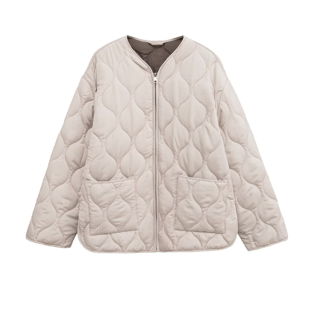Women's non-quilted oversized quilted jacket with round neckline, full-length zipper, and patch pockets Mune Fashion