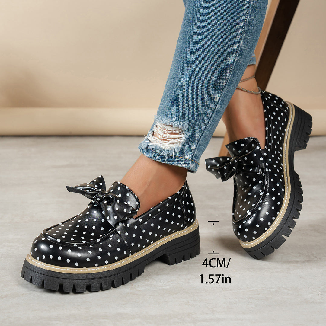 Women's casual loafers with polka dot pattern and decorative bow on a profiled platform sole Mune Fashion