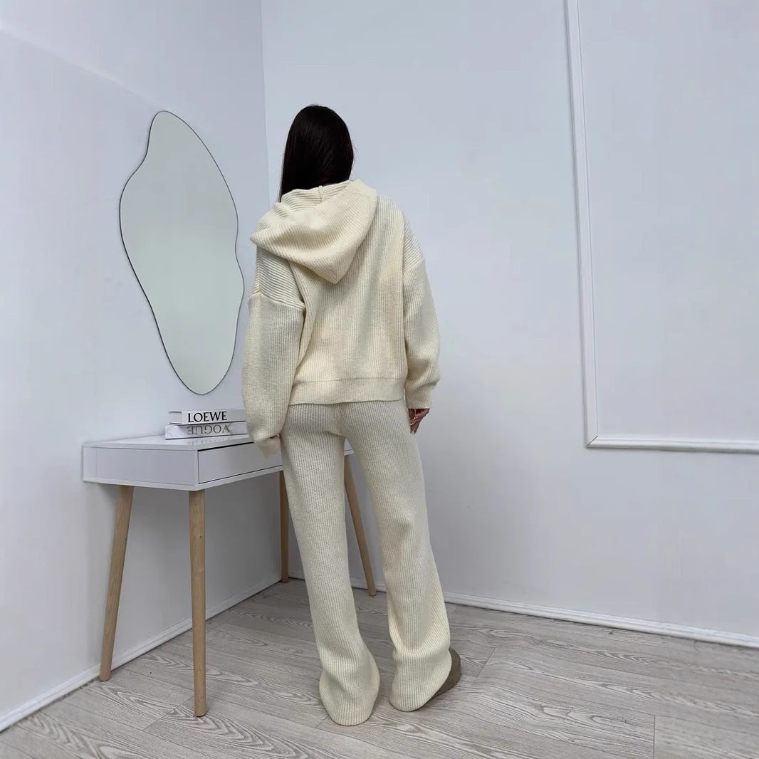 Women's elegant cashmere-like knit set with asymmetric waterfall collar and flowing palazzo knit trousers Mune Fashion