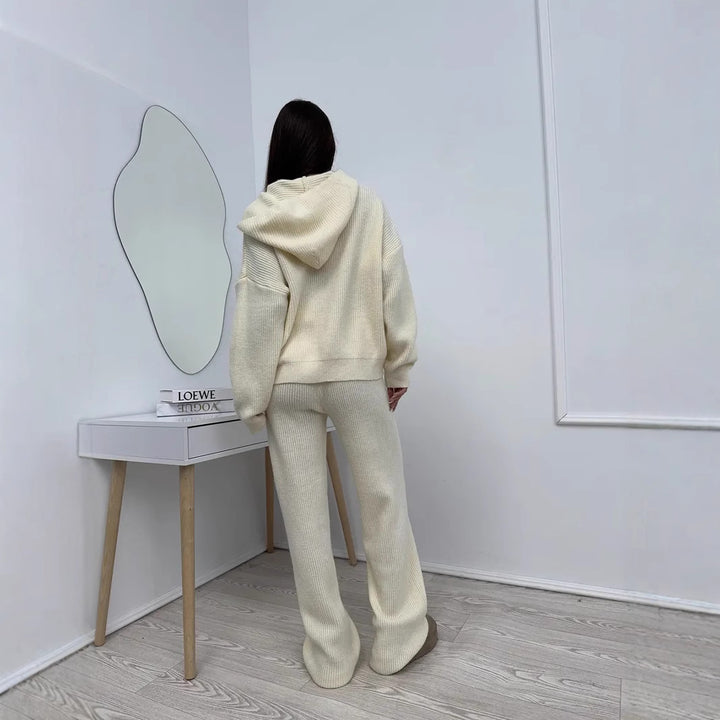 Women's elegant cashmere-like knit set with asymmetric waterfall collar and flowing palazzo knit trousers Mune Fashion