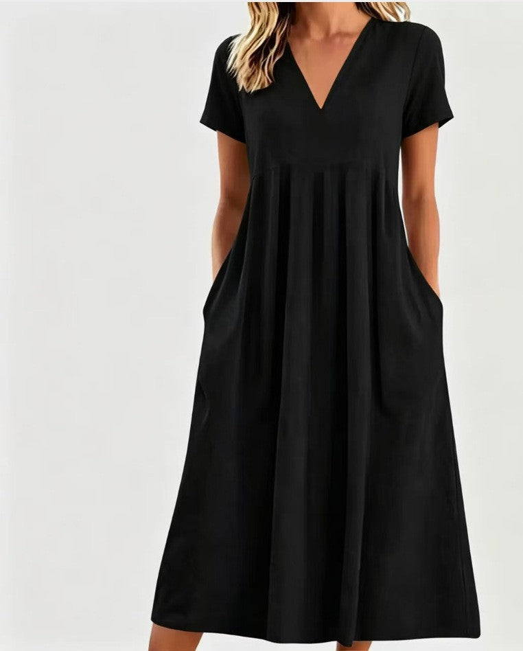 Women nan legeres V-neck midi dress with side pockets and gathered empire seam Mune Fashion