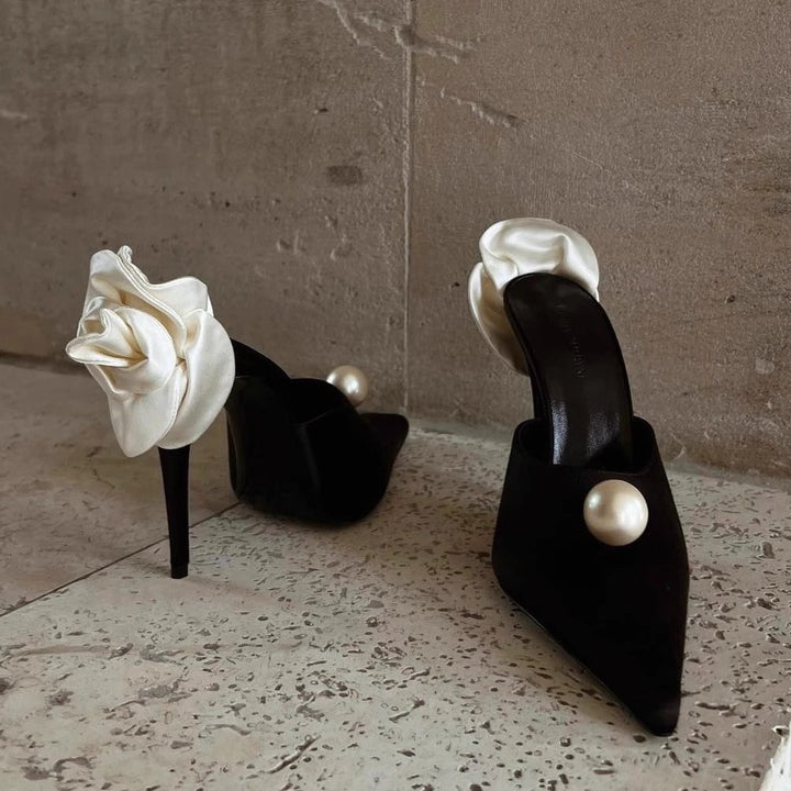 Women's pointed toe mules with decorative pearl, ruffled heel strap, and lace-up strap Mune Fashion