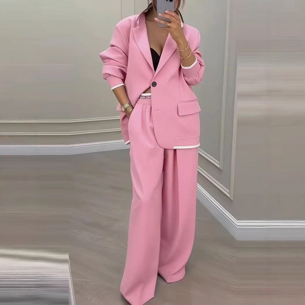 Women Oversize Tailoring Set with contrast piping, single-button blazer and high-cut wide-leg pants Mune Fashion