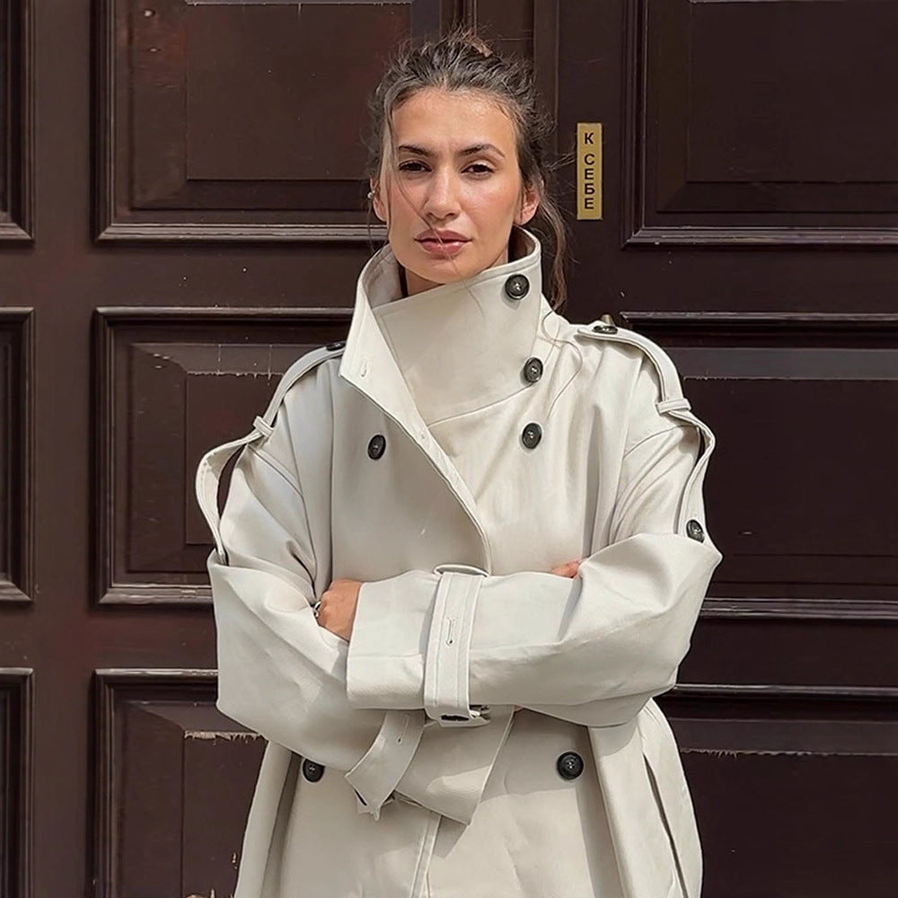 Women's waistless long trench coat in oversized cut with double button placket and shoulder epaulettes Mune Fashion
