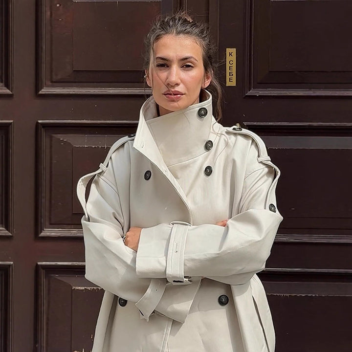 Women's waistless long trench coat in oversized cut with double button placket and shoulder epaulettes Mune Fashion