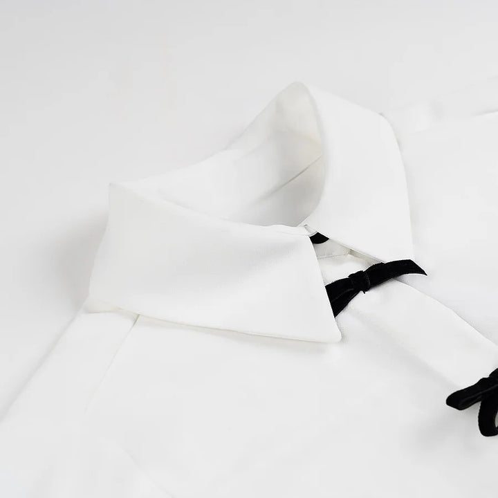 Women nan minimalist cotton blend blouse with concealed button placket and decorative bows at the front Mune Fashion