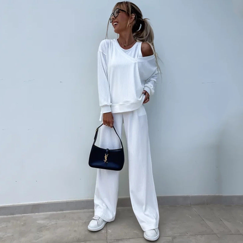 Women's elegant ribbed two-piece lounge set with one-sided off-shoulder cut and wide palazzo pant leg Mune Fashion