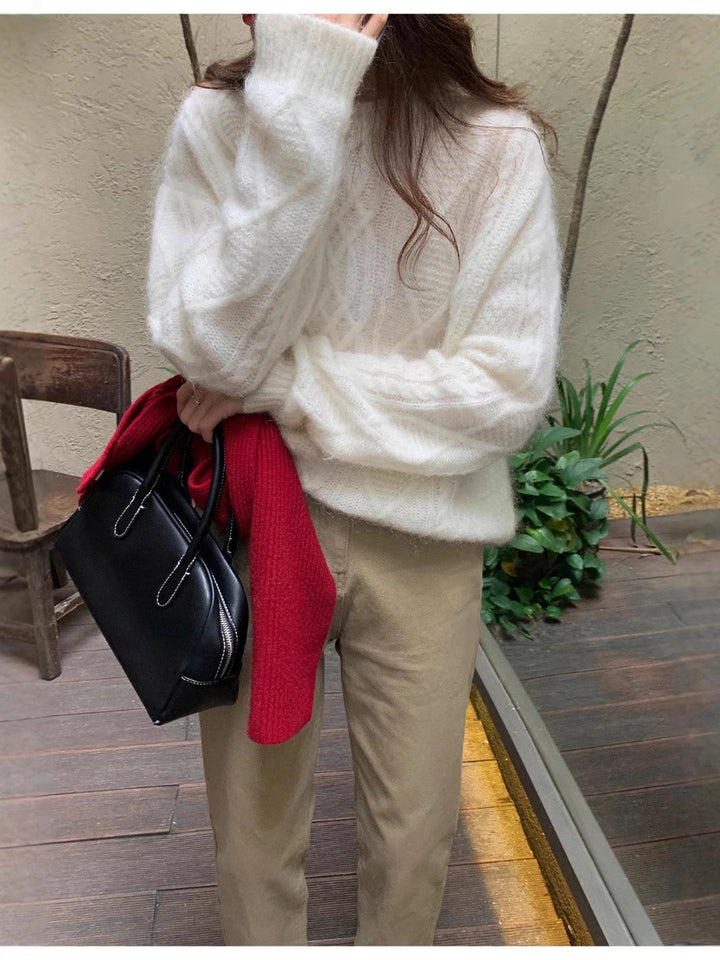 Women's structured leather handbag with detachable shoulder strap and rounded body shape Mune Fashion