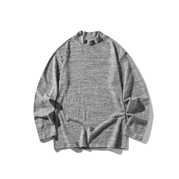 Unisex fine knit mock neck sweater with mottled structure and relaxed fit Mune Fashion