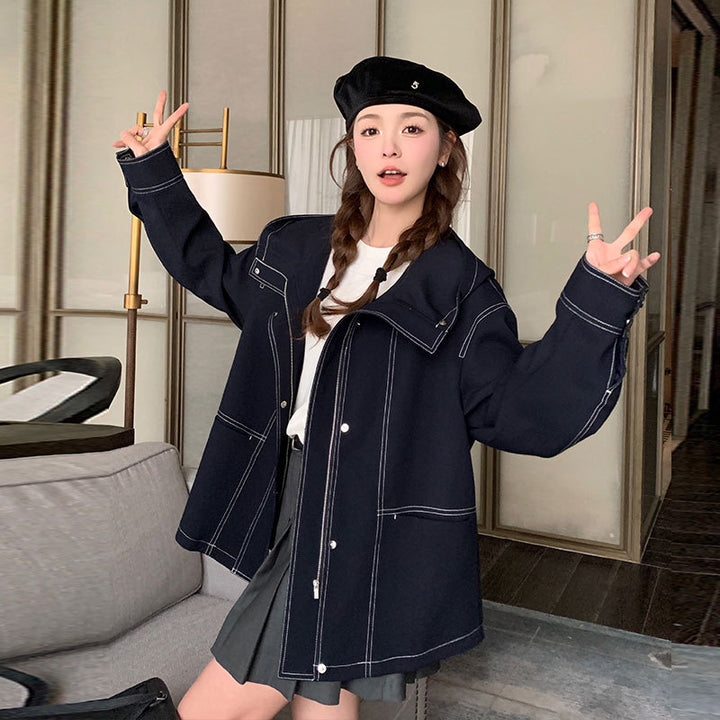 Women's short jacket with high stand-up collar, contrasting decorative seams and boxy oversized silhouette Mune Fashion