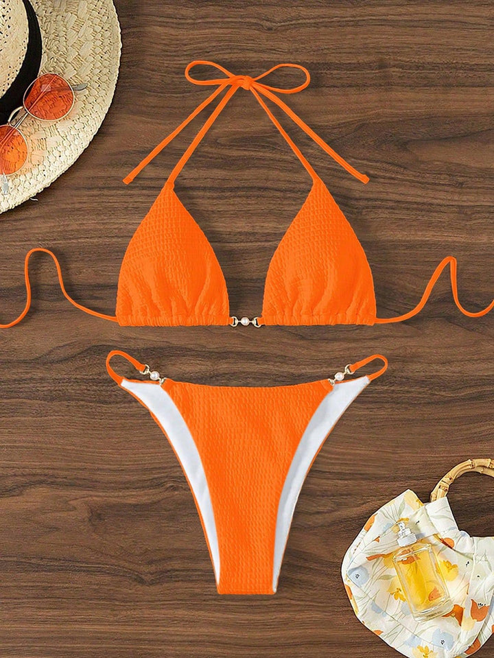 Women's Triangle Bikini with fashionable lacing details and elegant accents Mune Fashion