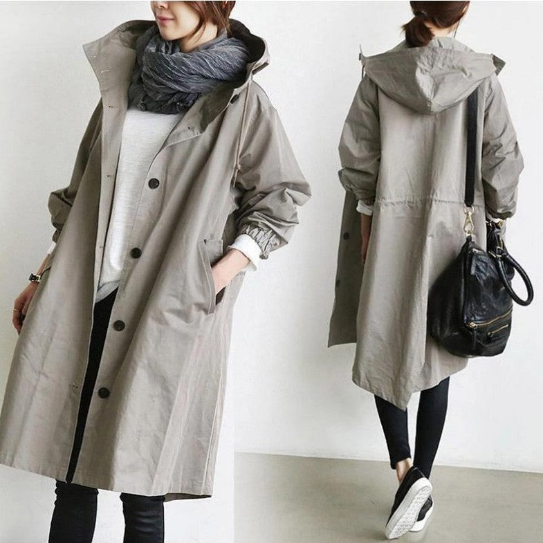 Women's lightweight oversized raincoat with hood and concealed button placket Mune Fashion