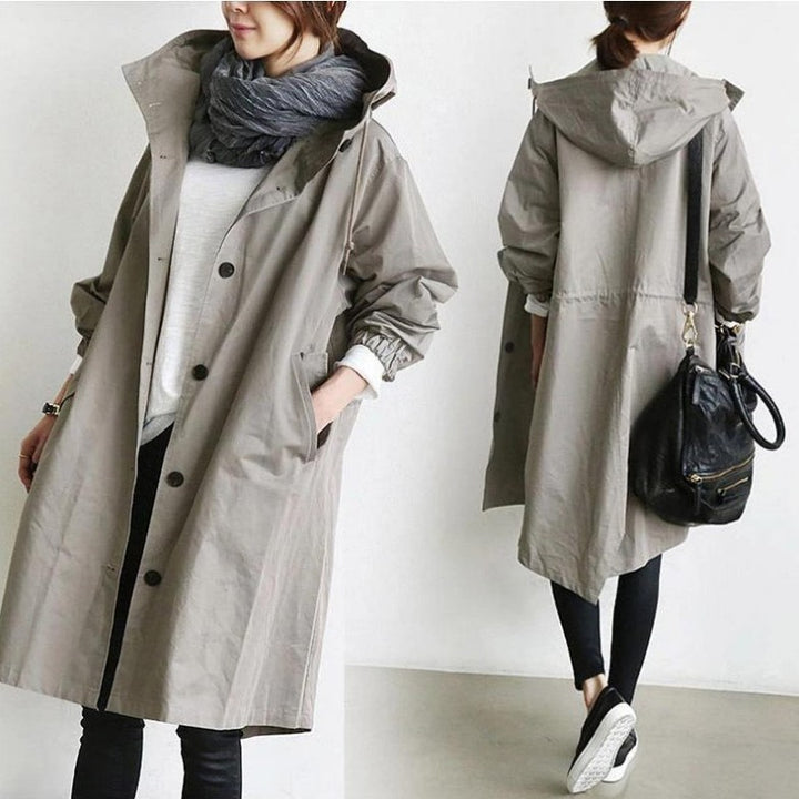 Women's lightweight oversized raincoat with hood and concealed button placket Mune Fashion