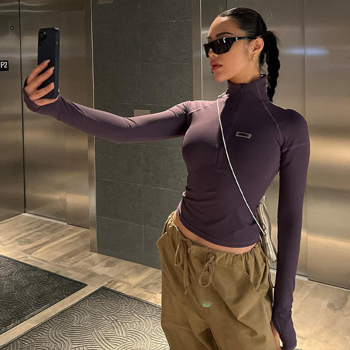 Women's form-fitting long sleeve zip top with deep V-neck and elastic functional stretch Mune Fashion