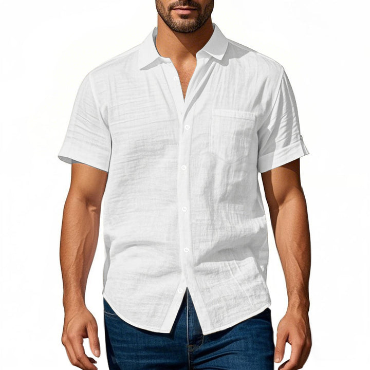 Men's short-sleeved casual shirt made of linen blend with chest pocket and rounded hem Mune Fashion