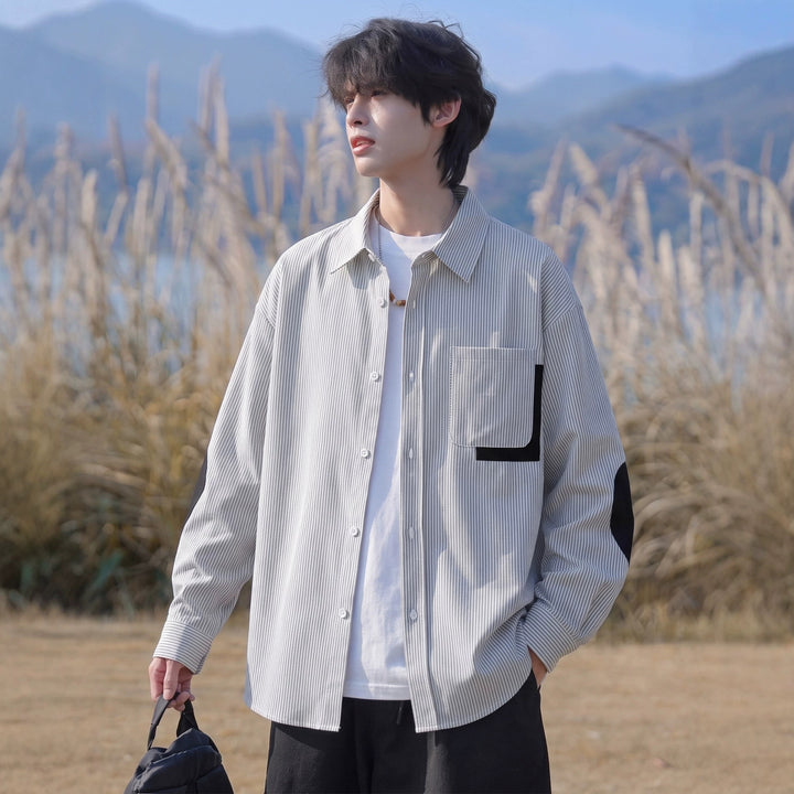 Men's oversized shirt with fine pinstripe, contrast pocket, and elbow patches Mune Fashion