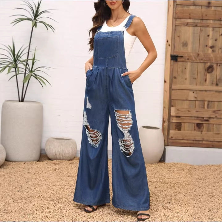 Women's loose distressed overalls with adjustable straps and large knee rips Mune Fashion