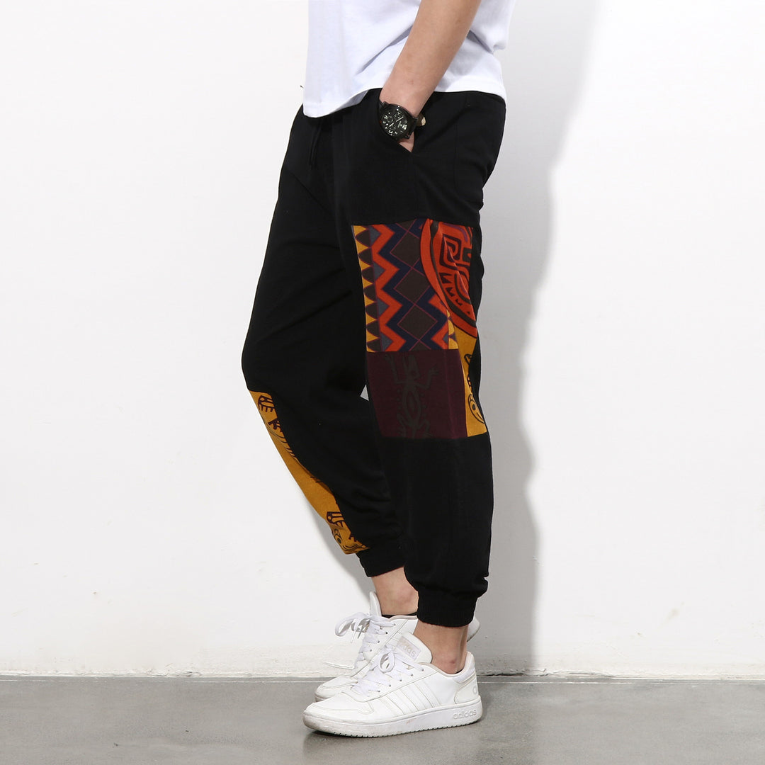 Men's jogging pants with side panel prints, drawstring and ribbed cuffs Mune Fashion