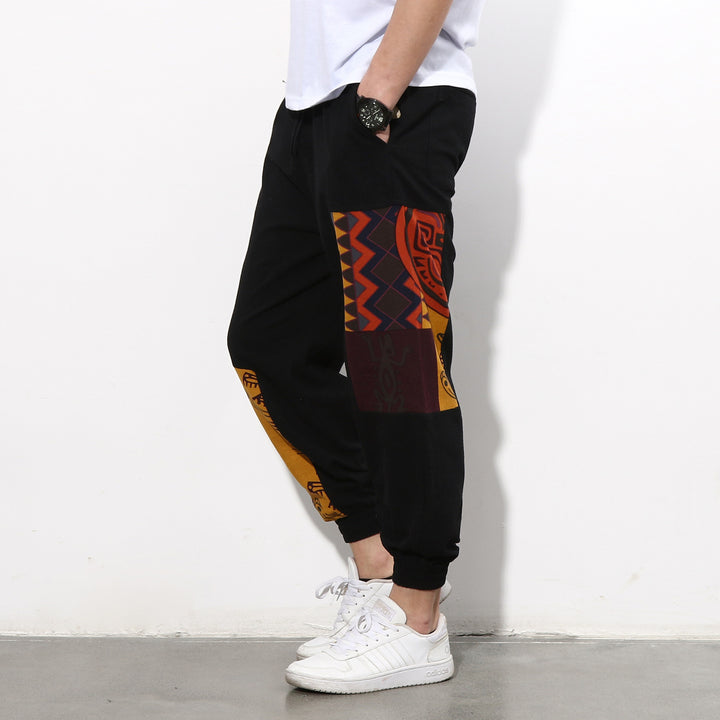 Men's jogging pants with side panel prints, drawstring and ribbed cuffs Mune Fashion