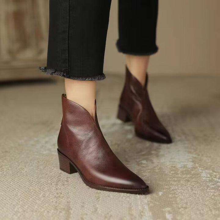 Women's pointed Chelsea-inspired ankle boot with asymmetric shaft and mid-high block heel Mune Fashion