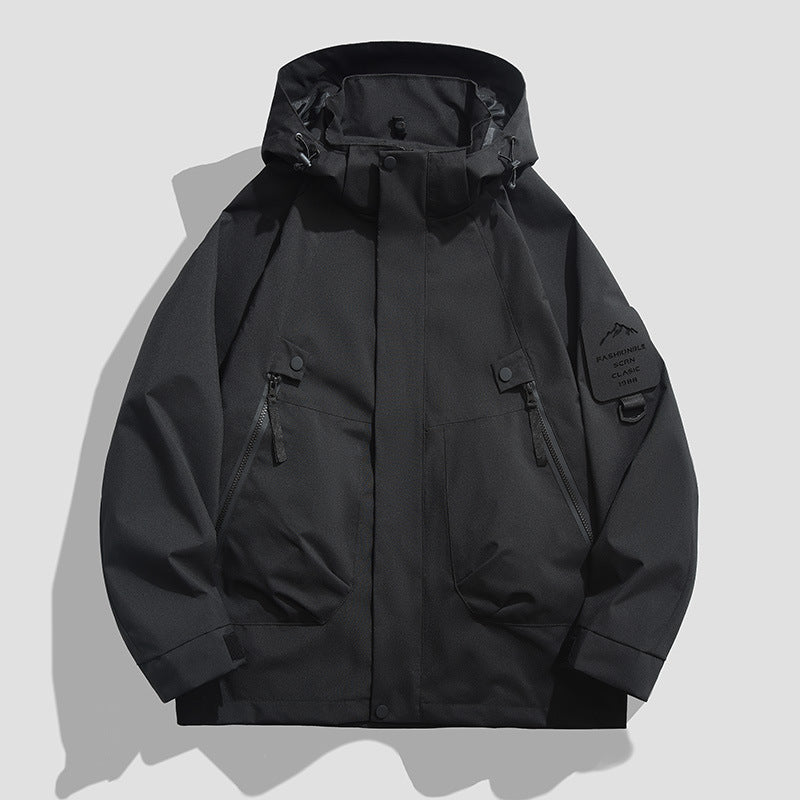 Men's Waterproof Utility Softshell Jacket with Hood, Diagonal Zipper Pockets & Adjustable Sleeve Straps Mune Fashion