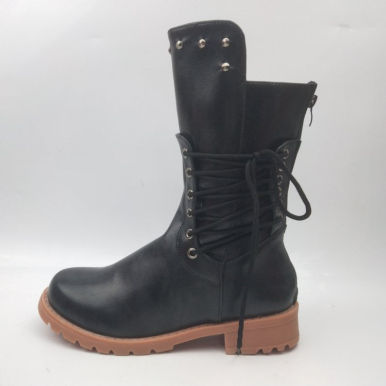 Women's rugged worker boots with decorative wrap lacing, metal eyelets, and profiled rubber outsole Mune Fashion