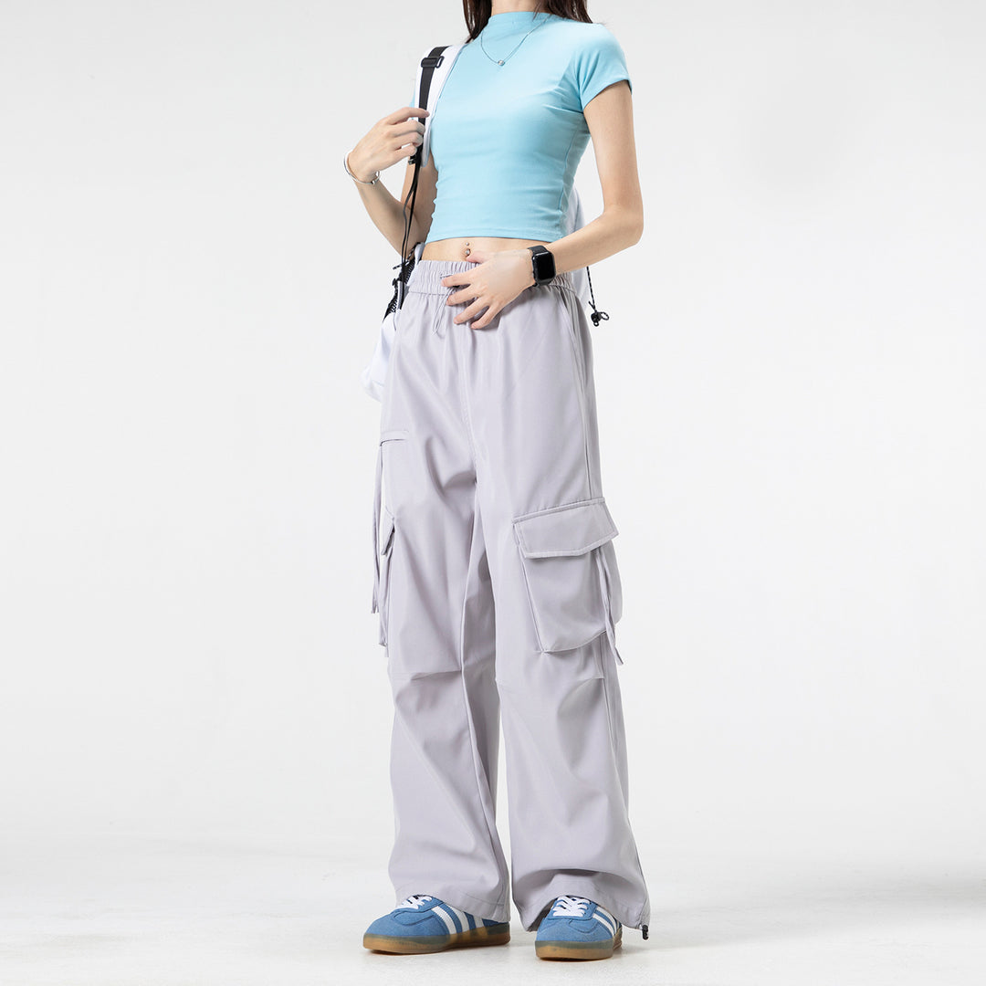 Damen Weite Cargo‑Hose im Baggy‑Cut mit elastischem Tunnelzugbund, Klapp‑Utility‑Taschen und verstellbarem Beinabschluss Mune Fashion