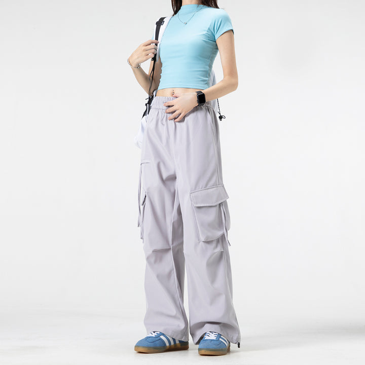 Damen Weite Cargo‑Hose im Baggy‑Cut mit elastischem Tunnelzugbund, Klapp‑Utility‑Taschen und verstellbarem Beinabschluss Mune Fashion