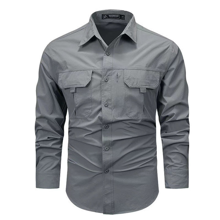 Men's robust field shirt with double chest flaps, concealed zip pocket and reinforced seams.