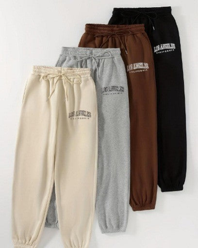 Ladies high-waisted lounge pants with elastic waistband and side pockets Mune Fashion