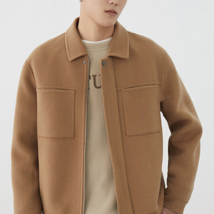 Men's short jacket made of wool blend with boxy fit, chest pockets, and concealed zipper Mune Fashion