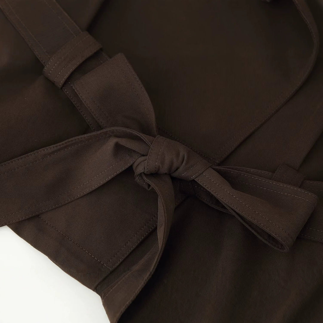 Women's short trench-style jacket with tie belt, raglan sleeves, and tailored fit Mune Fashion