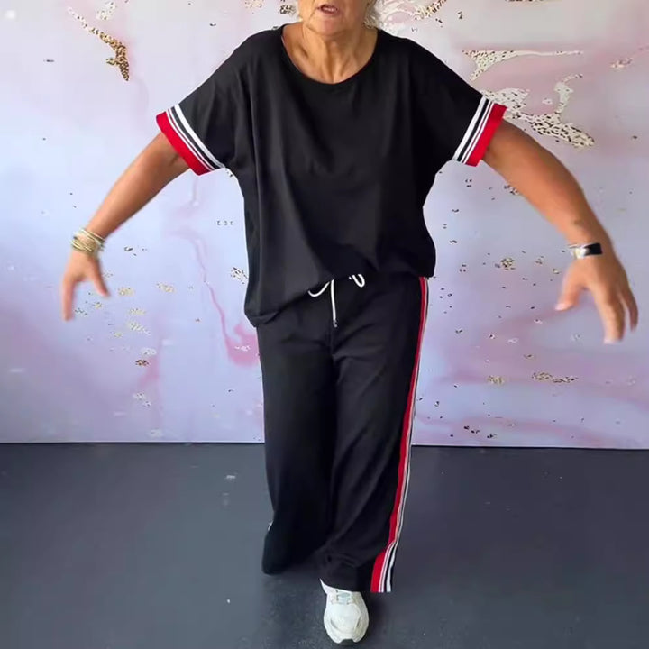 Ladies' sporty-elegant two-piece set with boxy short sleeve shirt, drawstring jog pants, and side contrast stripe Mune Fashion
