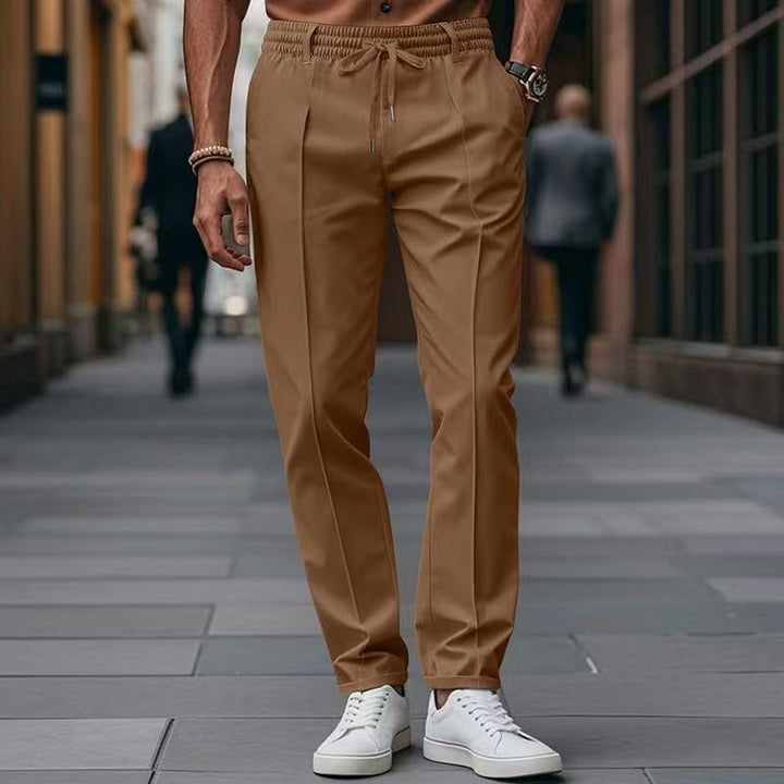 Men's elegant straight-cut chino jogging pants with crease, elastic waistband and drawstring Mune Fashion