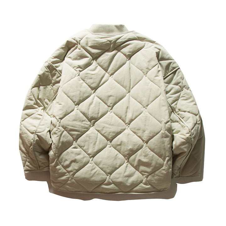 Unisex Short quilted bomber in boxy cut with ribbed collar and extra large flap pockets Mune Fashion