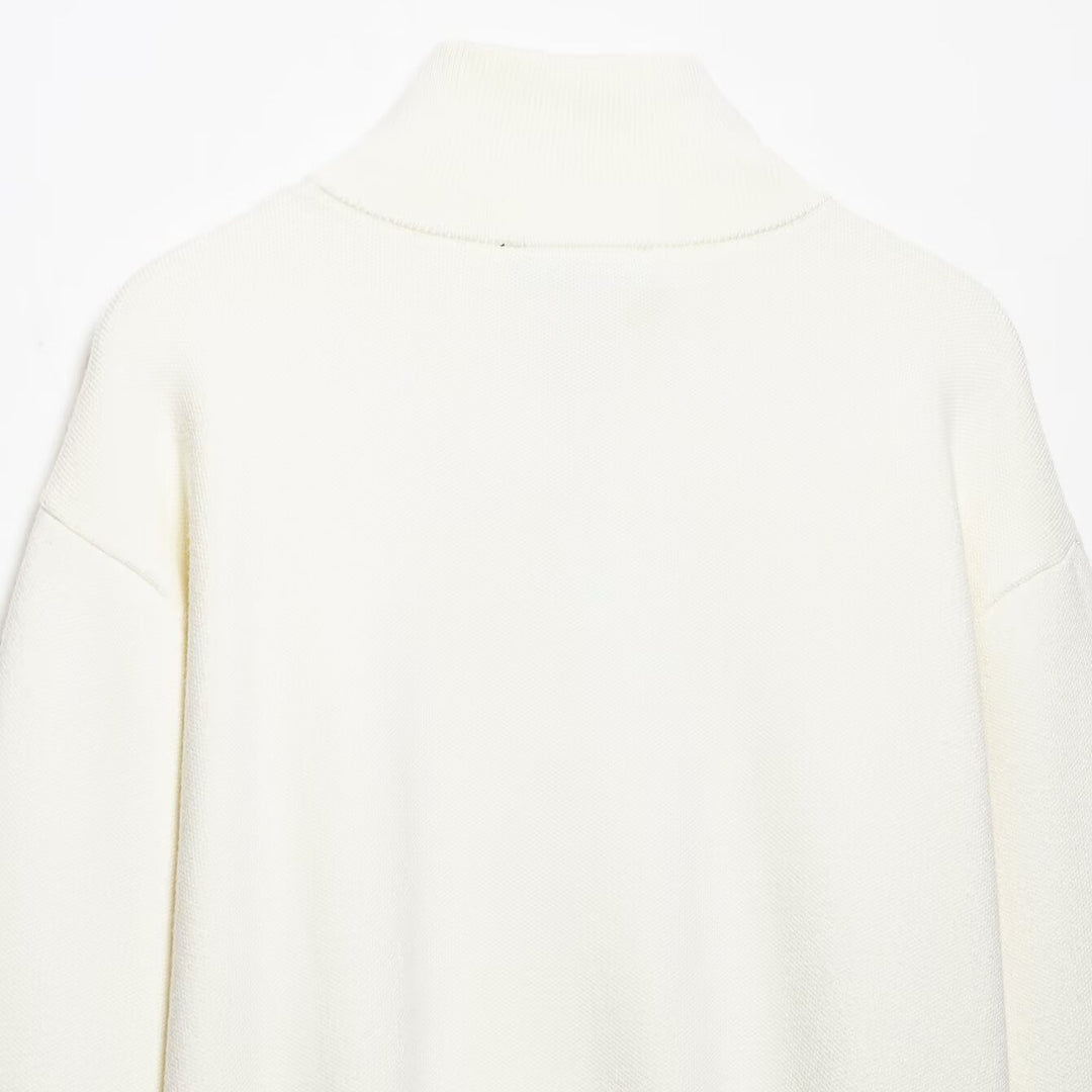 Women's chunky knit pullover with half zipper, stand collar and dropped shoulders Mune Fashion