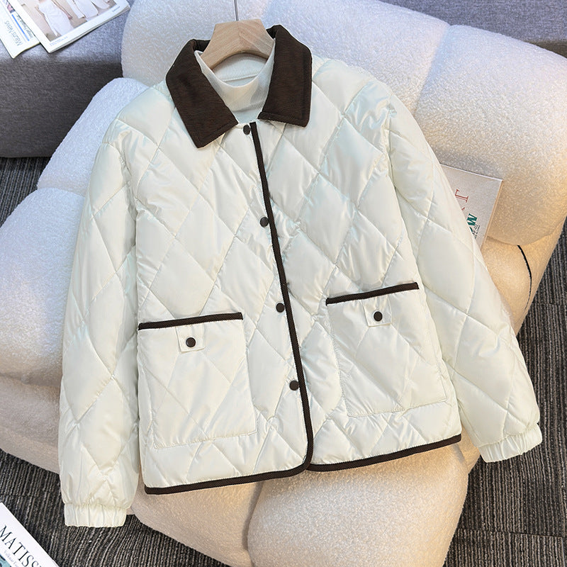 Women’s short quilted jacket with diamond stitching, cord collar, and flap pockets Mune Fashion