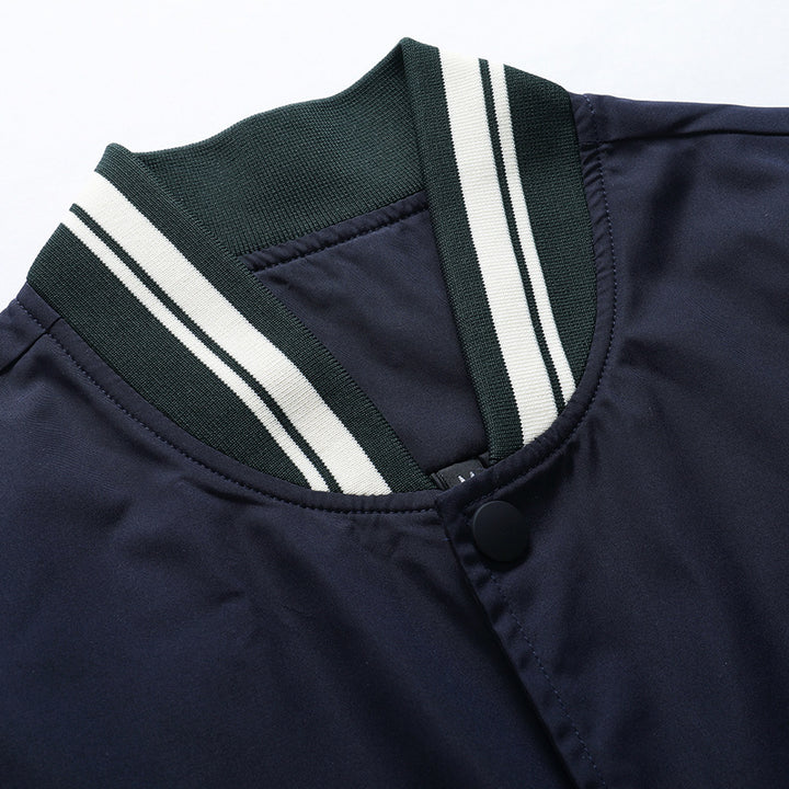 Men's varsity bomber jacket in retro college style with contrast sleeves and striped ribbed cuffs Mune Fashion