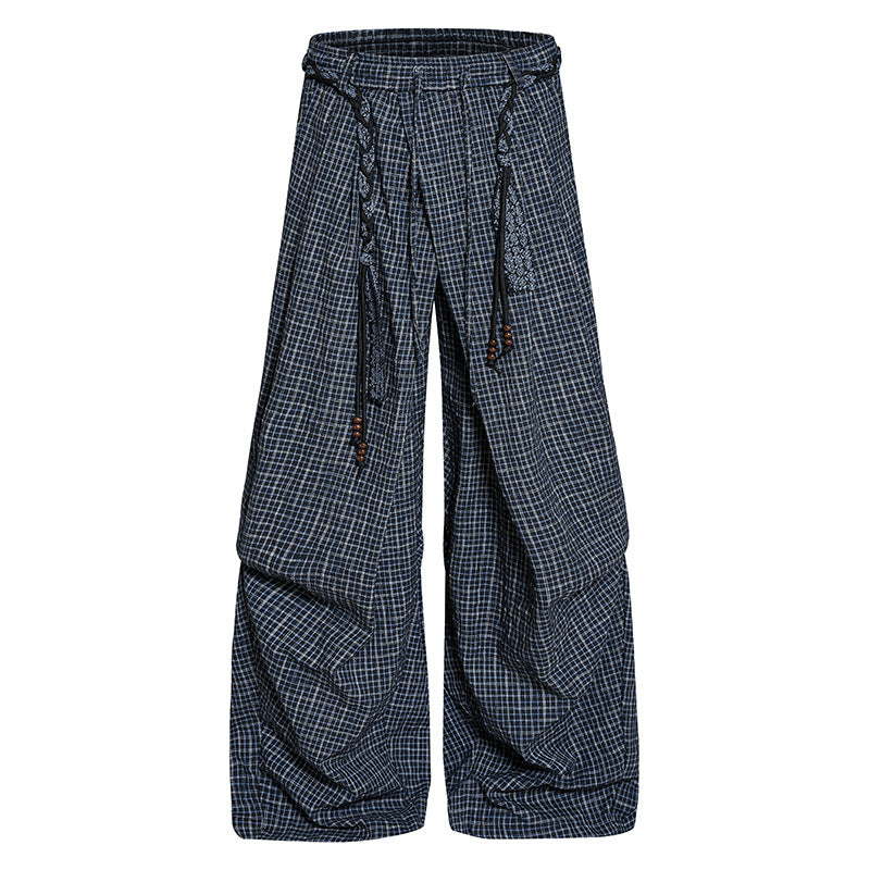 Women's wide palazzo pants with layered pleats, high waistband, and decorative cord belt Mune Fashion