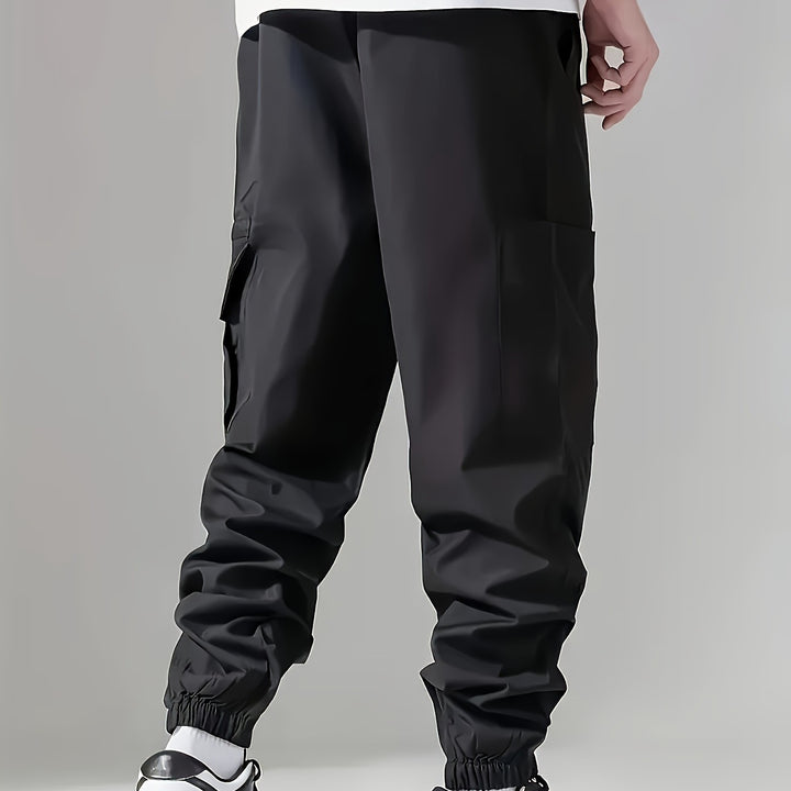 Men's cargo jogging pants in utility style with sealed zipper pocket & elastic leg cuffs Mune Fashion
