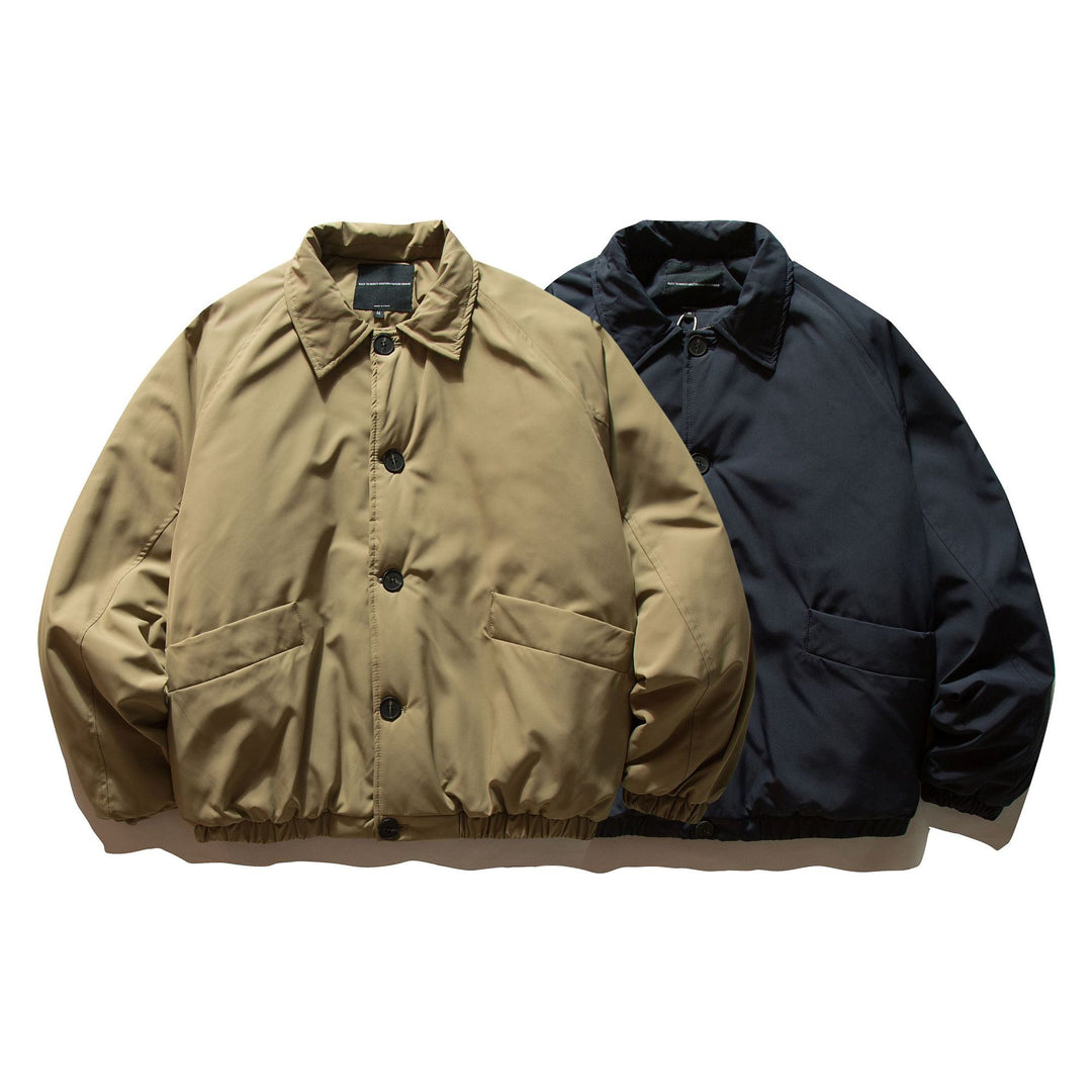 Men's short padded jacket with raglan sleeves, large flap pockets, and elastic hem Mune Fashion