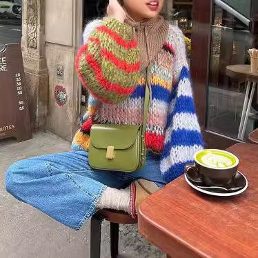Women's Cozy Knit Sweater with Flared Sleeves and Colorful Stripe Pattern Mune