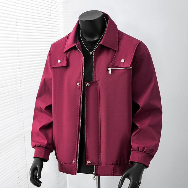 Men's lightly padded bomber coach jacket with concealed snap button placket, zipper chest pocket & ribbed cuffs Mune Fashion
